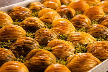 Turkish traditional dessert baklava with pistachio and walnut close up
