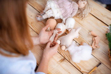 Workflow, masters of making handmade dolls. Shaping the doll's body.