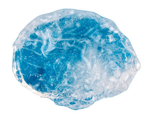 A piece of neon blue ice on a white background