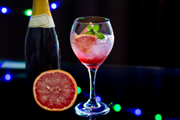 A fresh and elegant cocktail made with grapefruit and wine at the bar