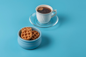 Soft Viennese waffles on a blue background	