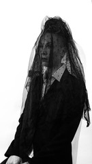 Woman wearing black veil