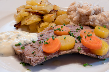 Viennese Boiled Beef Tafelspitz with Chive Sauce, Viennese Potatoes and Bread Horseradish