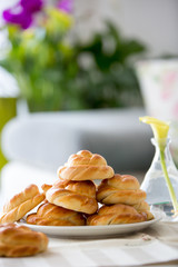 Bread buns in a plate on a table