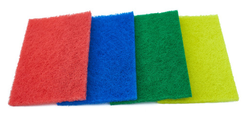 fiber scraper red blue green yellow close up isolated on white background