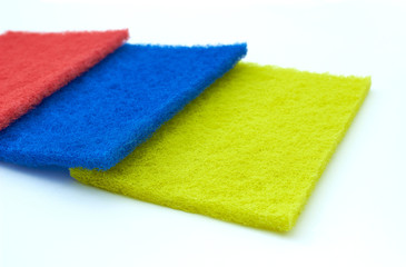 fiber scraper red blue yellow close up isolated on white background