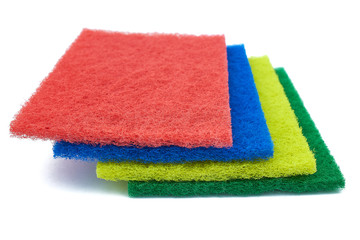 fiber scraper red blue green yellow close up isolated on white background