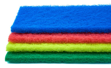 fiber scraper red blue green yellow close up isolated on white background