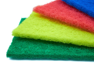 fiber scraper red blue green yellow close up isolated on white background