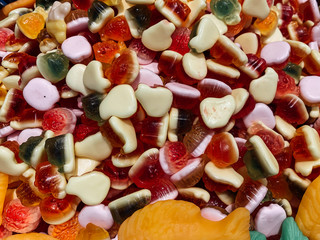 lots of delicious sweet candies for eating a pastry background