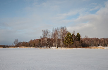 Beautiful winter landscape with ice river
