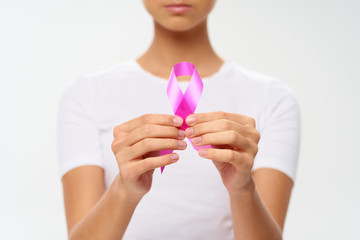 young woman holding a flower