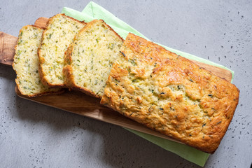 Fresh zucchini bread on a wooden board