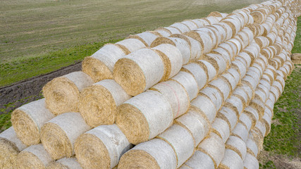 Storage straw bales in the field. Drone view