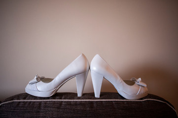Pair of white wedding shoes