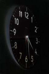 black wall clock with large dial