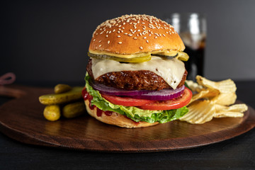 Homemade burger on a dark background