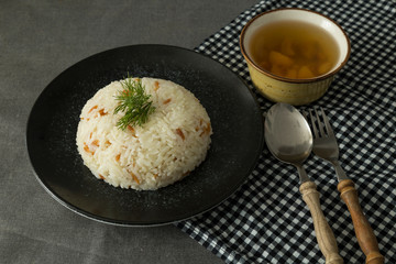 the rice food service in the plate at the restaurant.