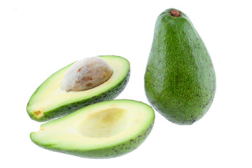 Avocado half cut isolated on white Clipping Path. Professional food photography