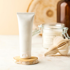 Empty white cosmetic tube of cream or gel. Ready for your packaging design. Spa concept, skin care. 