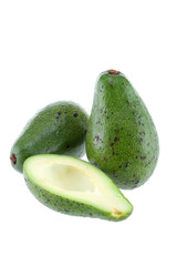Avocado half cut isolated on white Clipping Path. Professional food photography