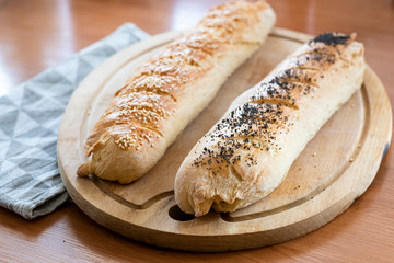 homemade baguette with poppy seeds and sesame