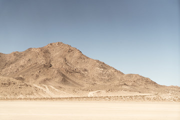 desert mountain on dry lakebed