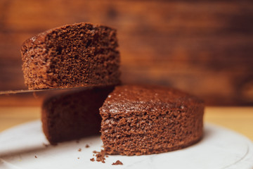 still life of a brownie with wooden background
