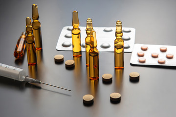 medical ampoules for injection, tablets and syringe. medicines and disease treatment. pharmacology and science