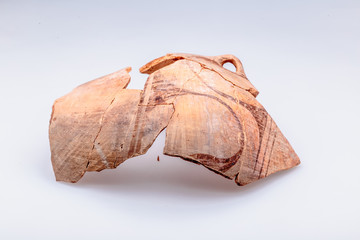 Archaeological excavations. The remains of ancient ancient clay jugs. Tripolie.