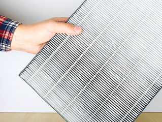 air filter in hand background light