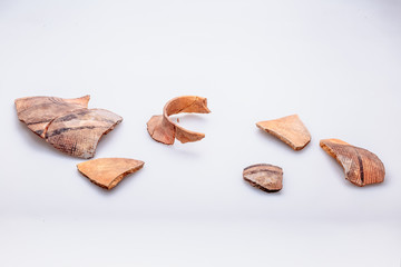 Archaeological excavations. The remains of ancient ancient clay jugs. Tripolie.