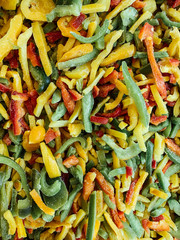 lots of frozen vegetables for cooking salad background