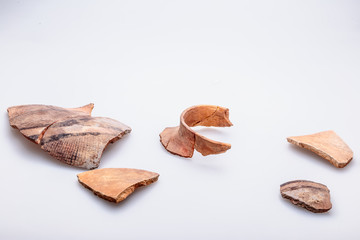 Archaeological excavations. The remains of ancient ancient clay jugs. Tripolie.
