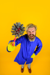 House cleaning. Toilet brush. Man with toilet brush. Cleaning and Disinfection. Coronavirus. Professional cleaning. Cleaning service. Cleanup. Clearing tools. Household. Housekeeping.