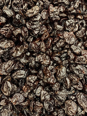 lots of dried prunes for eating background