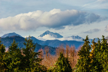 Mountains, woods and clouds above. View of Apennine