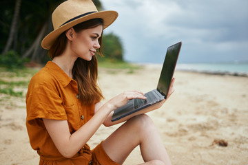Fototapeta premium young woman with laptop