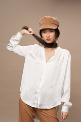 young woman in baseball cap