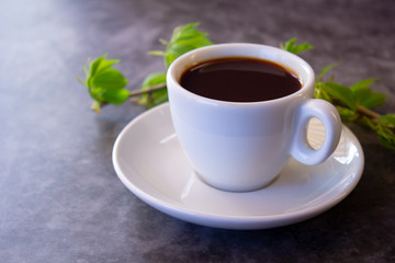 cup of aromatic hot coffee on a dark background flat lay