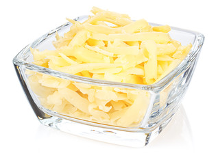 Grated cheese in a small transparent glass square bowl isolated on white background