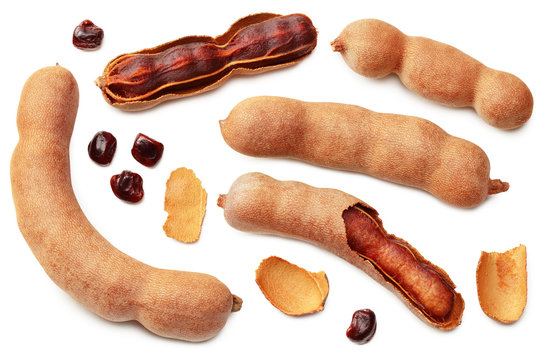 fresh tamarind fruits isolated on white background. top view