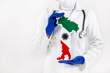 Doctor or nurse holding Italy map and flag. Coronavirus outbreak and pandemic concept. 2019-nCoV.