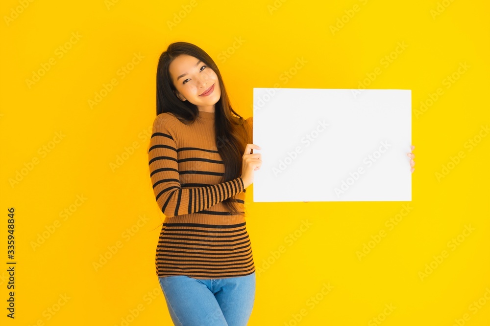 Wall mural portrait beautiful young asian woman with empty blank white card board for text