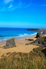 Fototapeta premium Bedruthan Steps (England), UK - August 13, 2015: Bedruthan Steps beach and coast, Cornwall, United Kingdom.