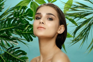 beautiful woman naked shoulders exotic tropics clean skin model