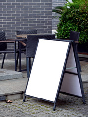 Blank poster stand for outdoor restaurant