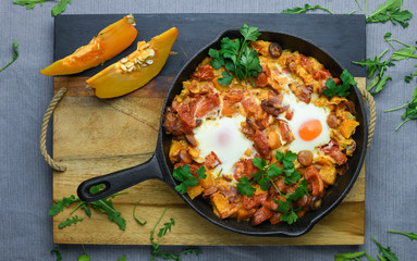 Spanish migas with pumpkin and meat