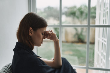 young woman in the window
