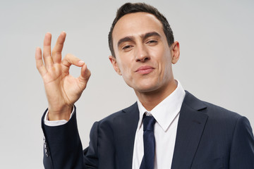 businessman showing stop sign